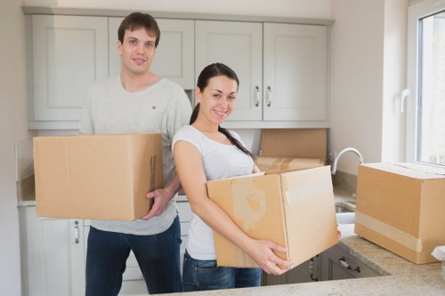 Packed moving boxes and furniture ready for house removals in Leytonstone